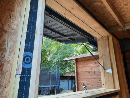 Abri de jardin en bois sur mesure à volet relevable