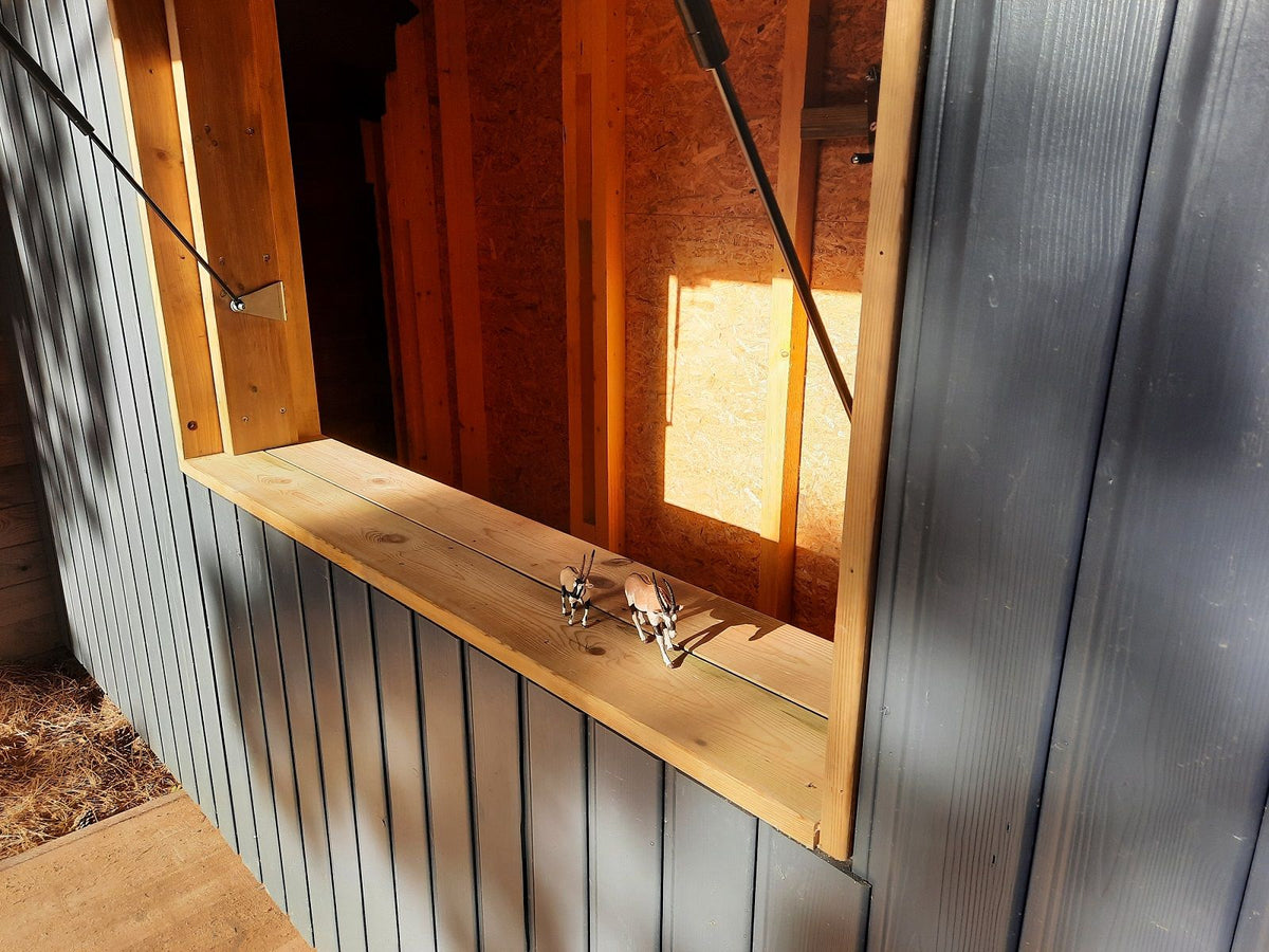 Abri de jardin en bois sur mesure à volet relevable